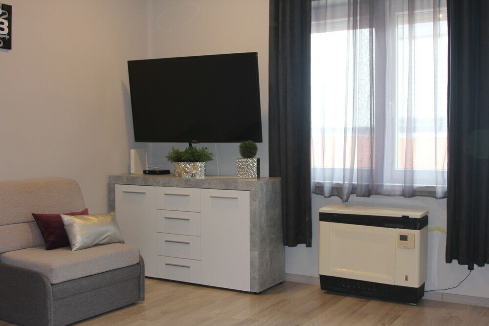 Фото Kitty Downtown Apartman