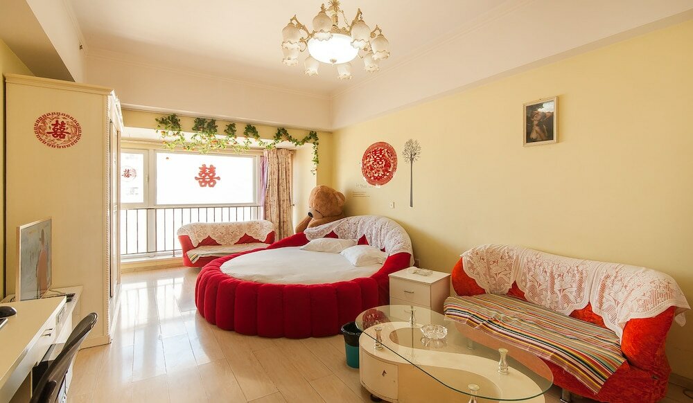 Фото Tianjin Xinyi Apartment Hotel