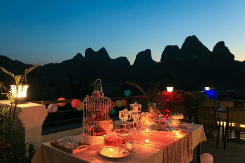 Гостиница Yangshuo Xingping Island Resort