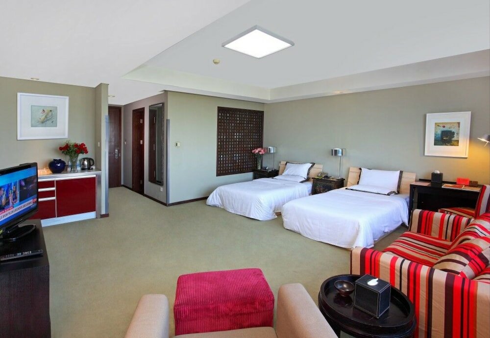 Фото Tianjin In-Zone Hotel