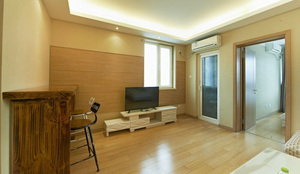 Фото Wanke City International Apartment