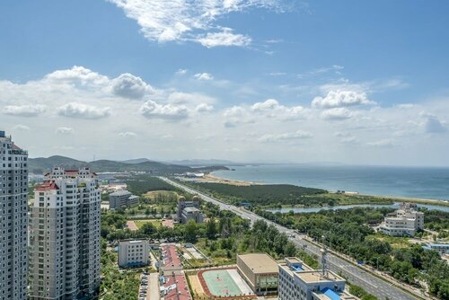 Гостиница WeiHai Emily's Holiday Apartment в Вэйхае