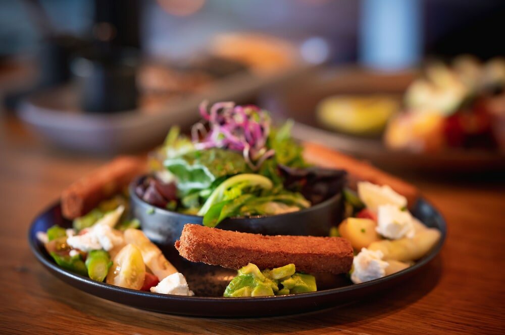 Фото Qube Hotel Bergheim