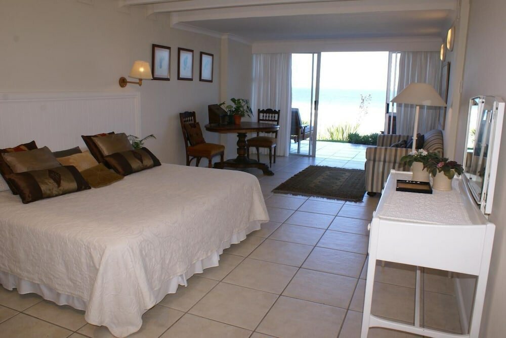 Фото The Pink Lodge on the Beach