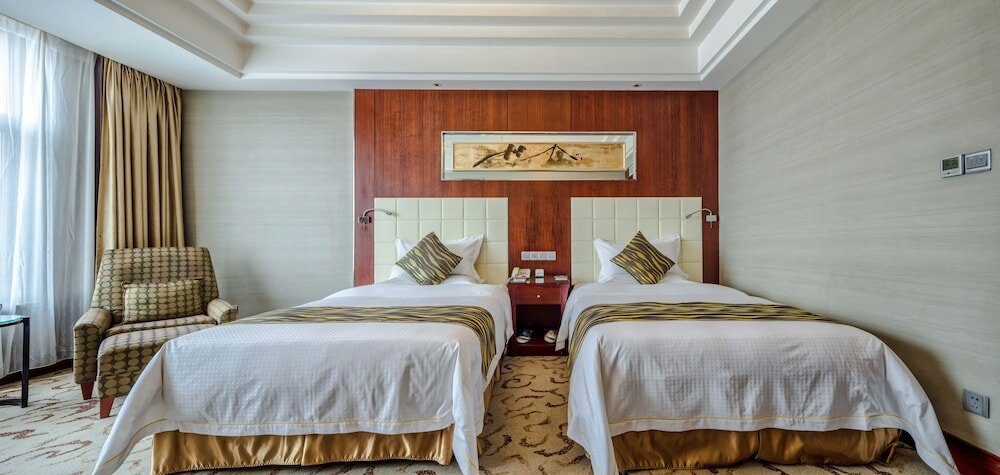 Фото Yungang Jianguo Hotel