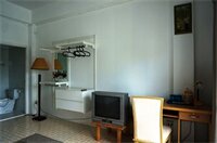 Фото Corner Cafe Bed and Breakfast