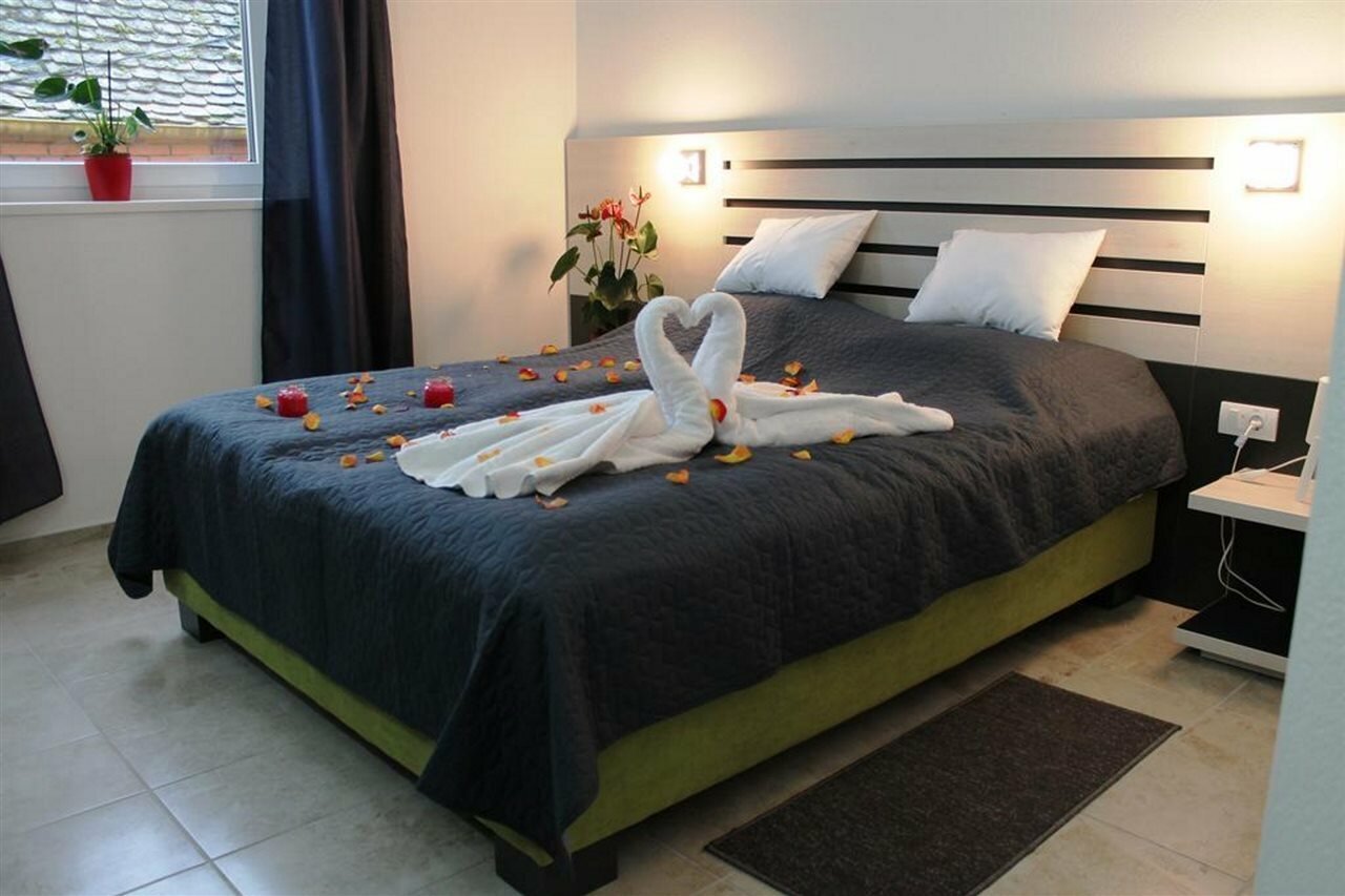 Фото Garni Hotel 11Tica DM