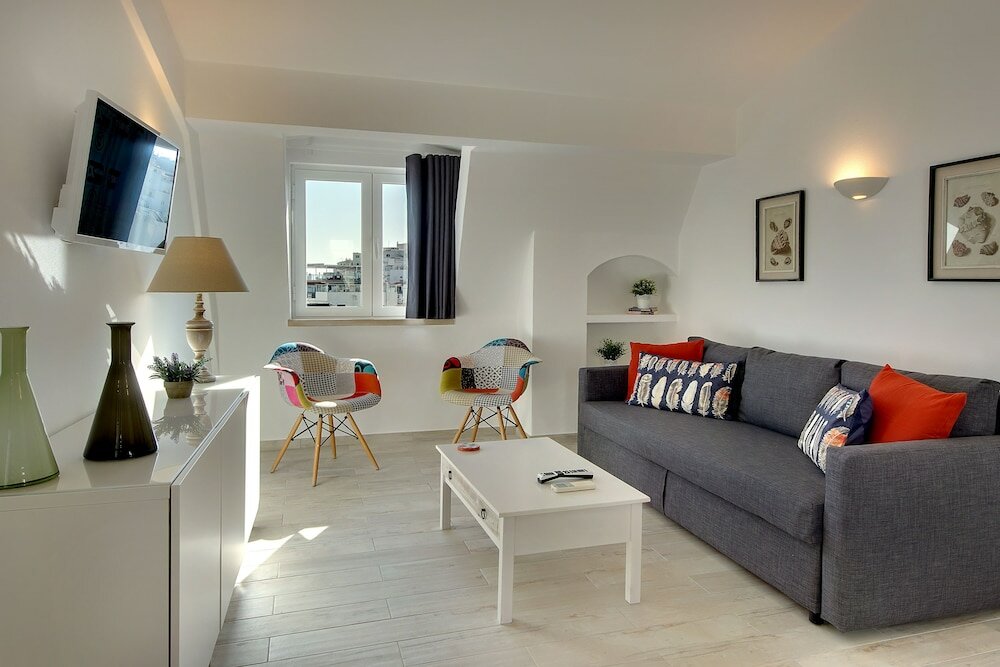 Фото Apartamentos Tucha