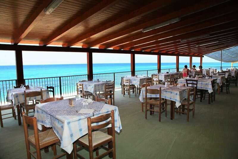 Гостиница Villagio Camping La Scogliera