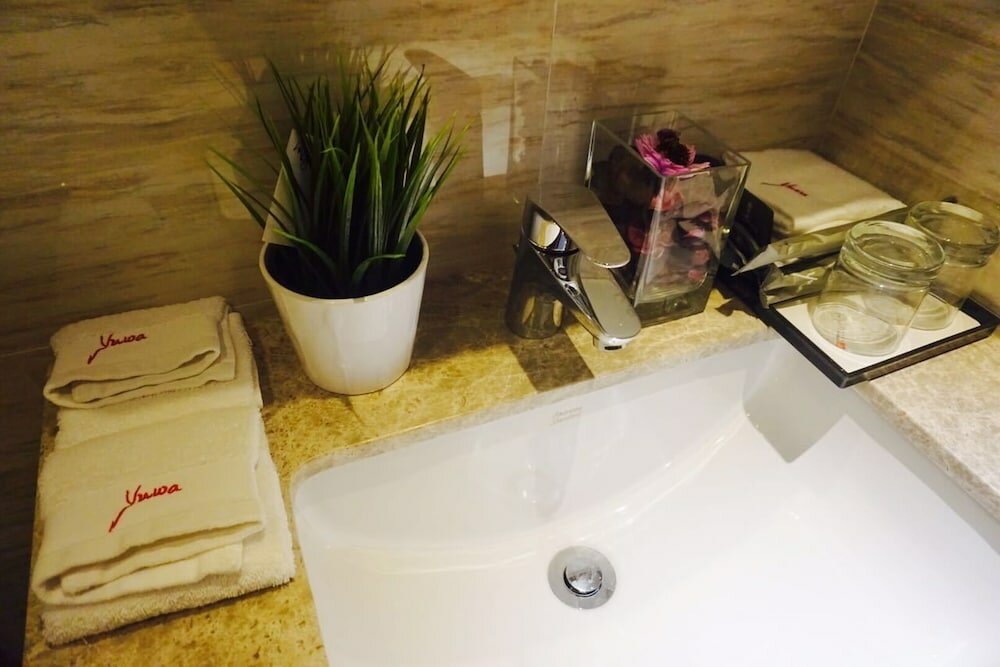 Фото Yuwa Serviced ApartHotel