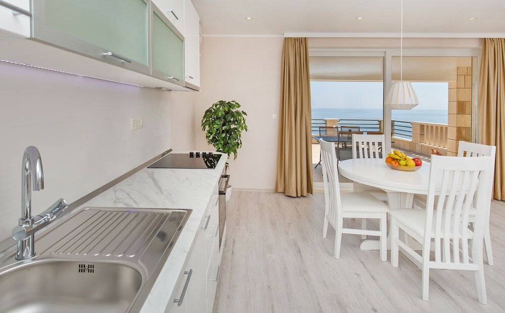 Фото Light Blue Apartment