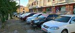 Sharq AvtoSavdo (Xonqa Street, 31), car dealership