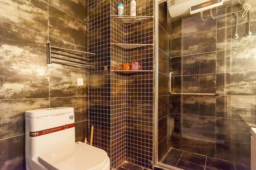 Фото Tianjin Xinyi Apartment Hotel