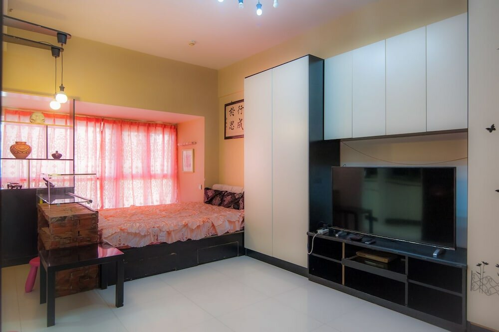 Фото Tianjin Xinyi Apartment Hotel