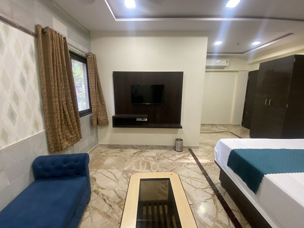 Фото Hotel Classio Inn - Kokilaben Hospital