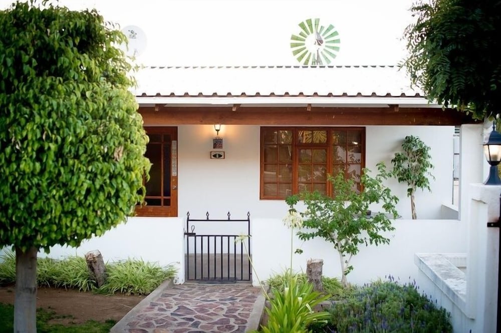 Фото Kleinplasie Guesthouse