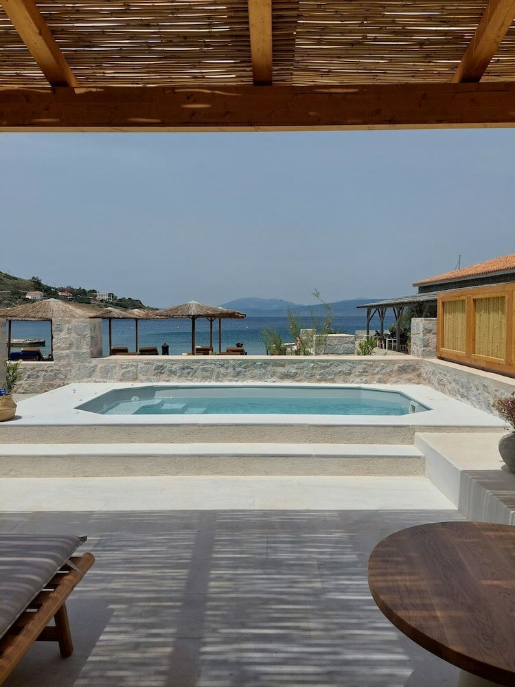 Фото Mandraki Beach Resort - Adults Only