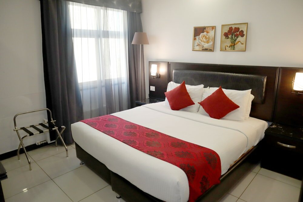 Фото Easy Inn Hotel Suites