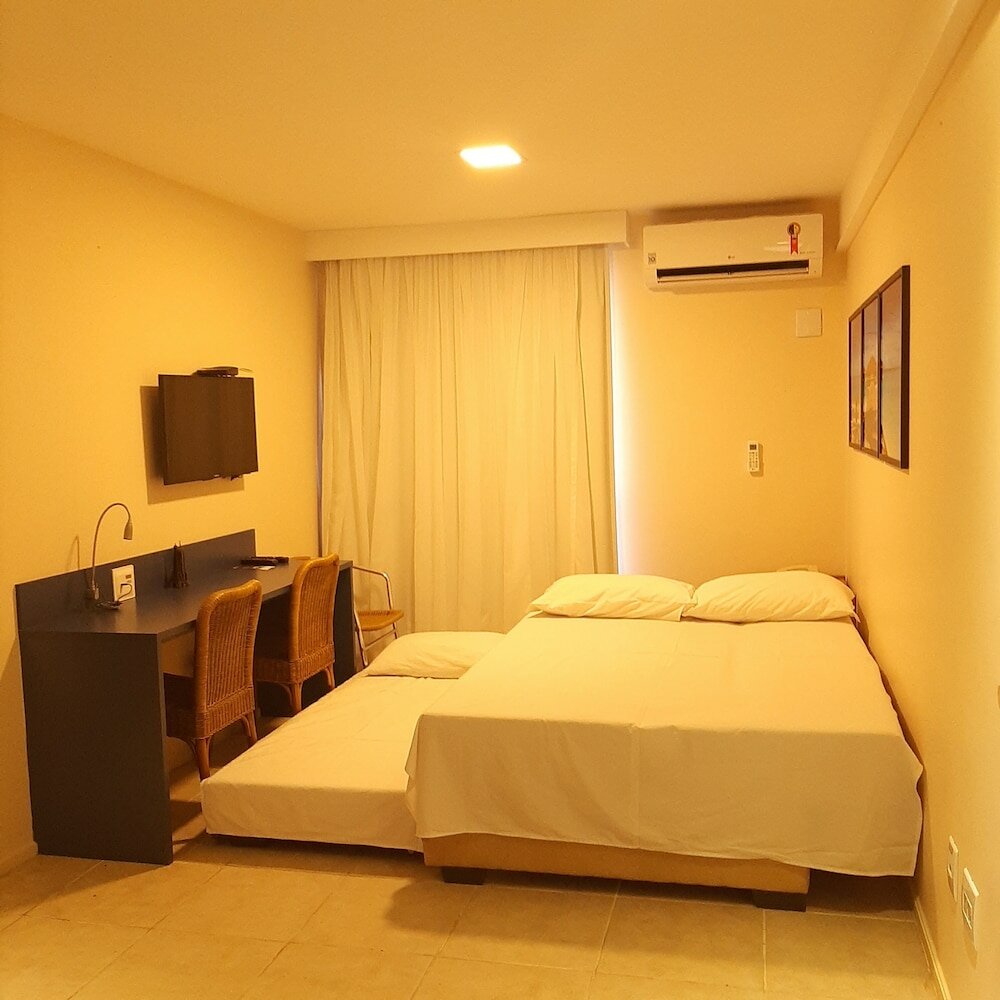 Фото Completo em Hotel Localização Perfeita