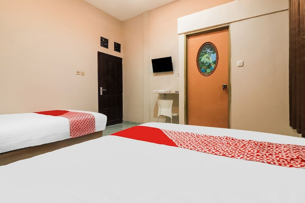 Фото Oyo 91021 Steze Kost & Guest House