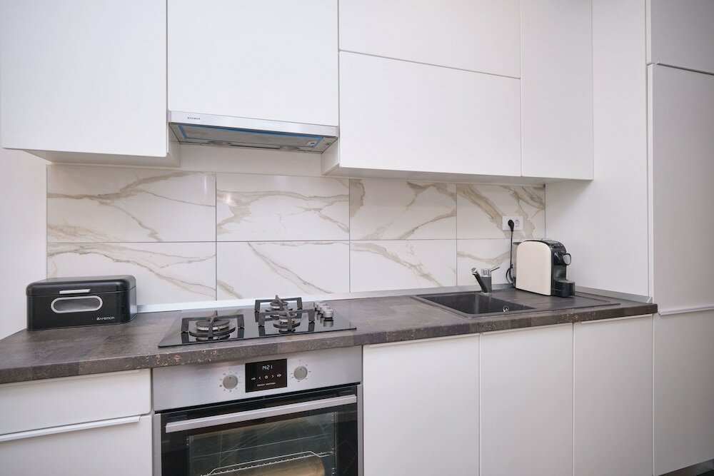 Фото Modern City Apartment