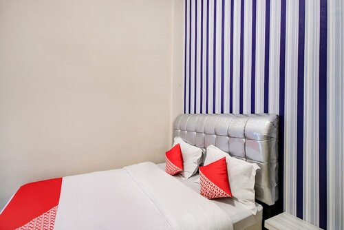 Гостиница Super Oyo 3389 Sonya Homestay Syariah в Тебингтинги