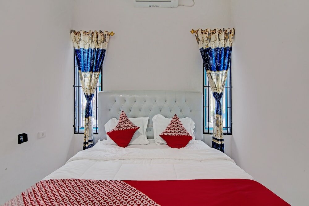 Фото Oyo 92211 Timur Raya Homestay Syariah