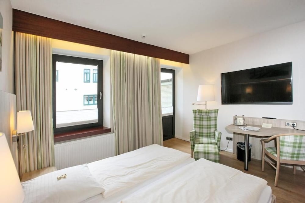 Фото Hotel Kirchspiels Gasthaus