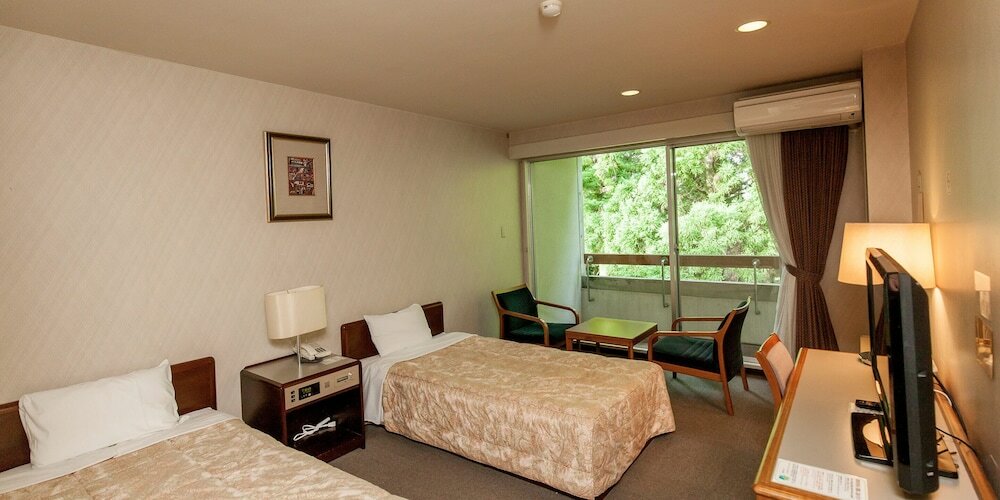 Фото Ymca International Youth Center Tozanso