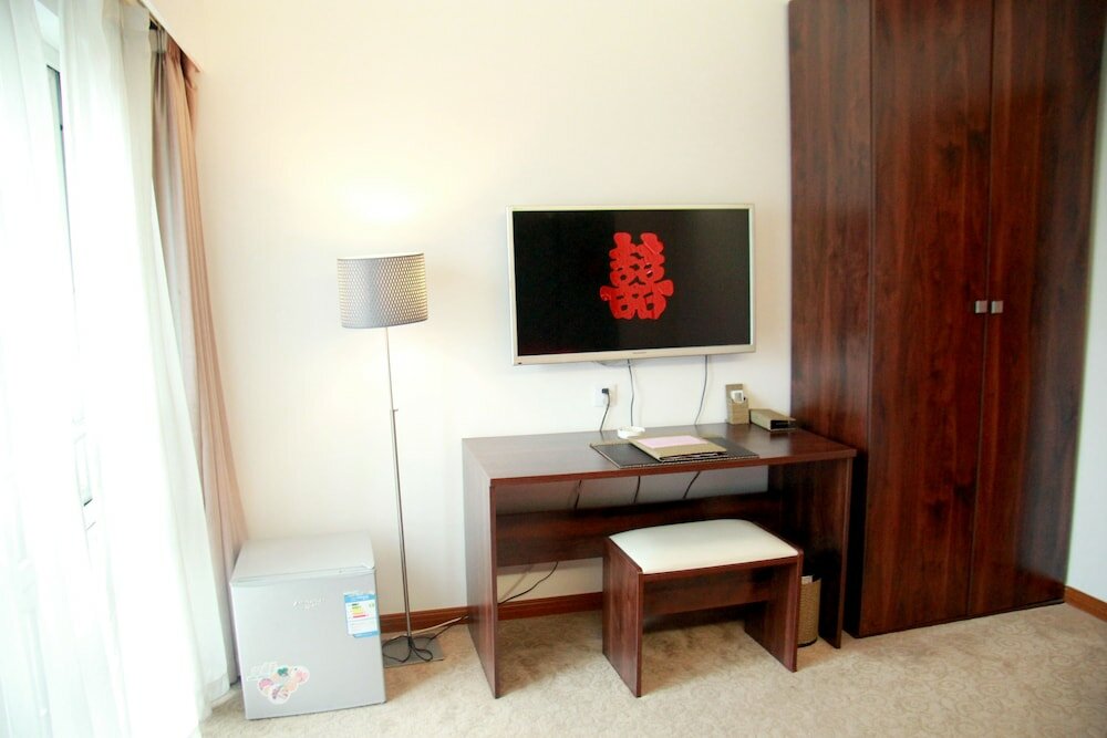 Фото Shanghai Coinfamily Hotel