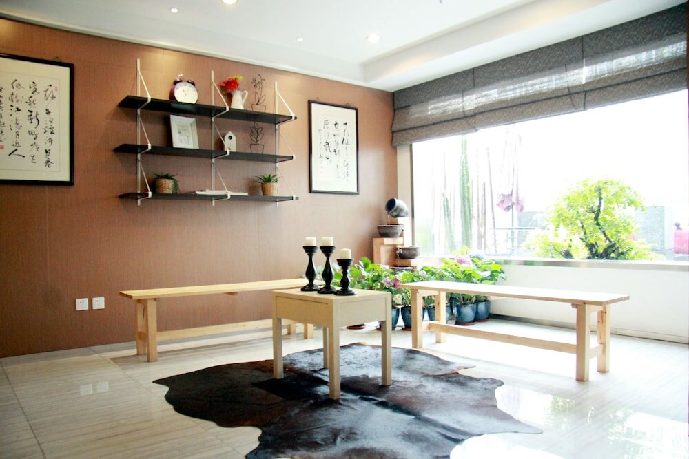 Фото Shanghai Coinfamily Hotel