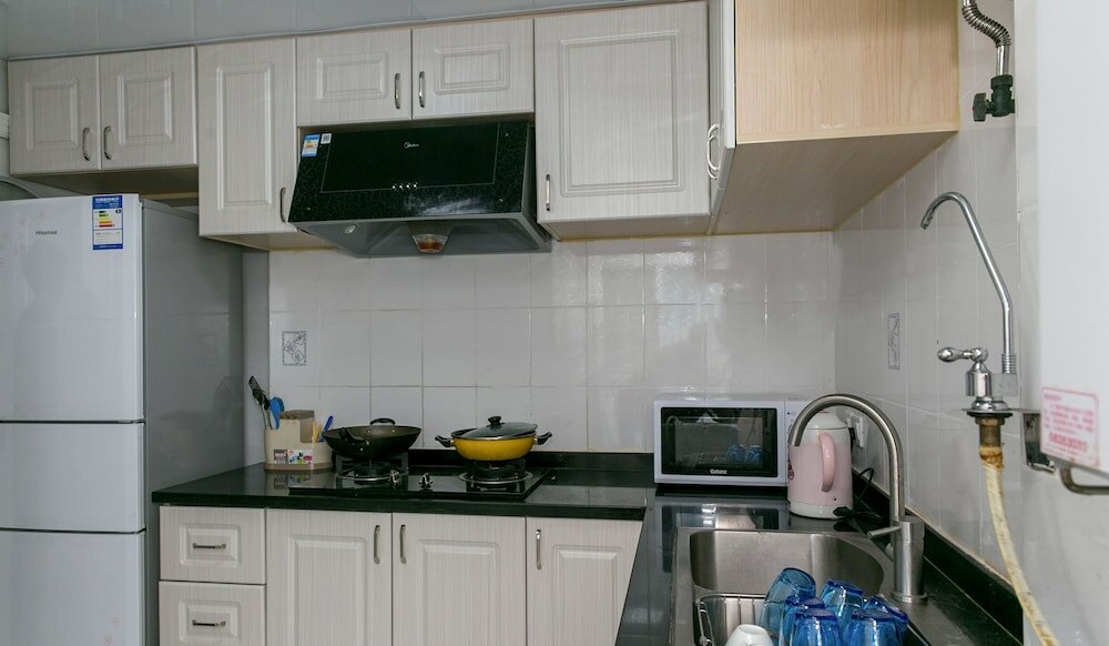 Фото GoNative Downtown Apartment Yu Garden