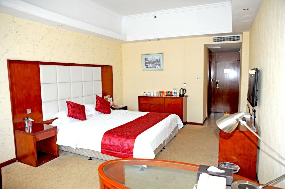 Фото Dinis Business Hotel Kaiyuan Branch