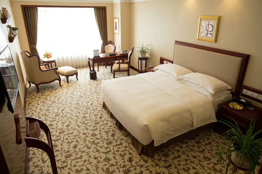 Фото Enrichee Gloria Plaza Hotel Qingdao