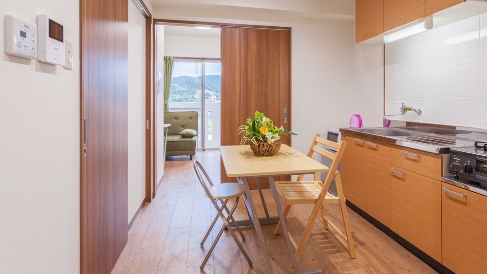 Фото Kariyushi Condominium Resort Kin Yaka Seaside