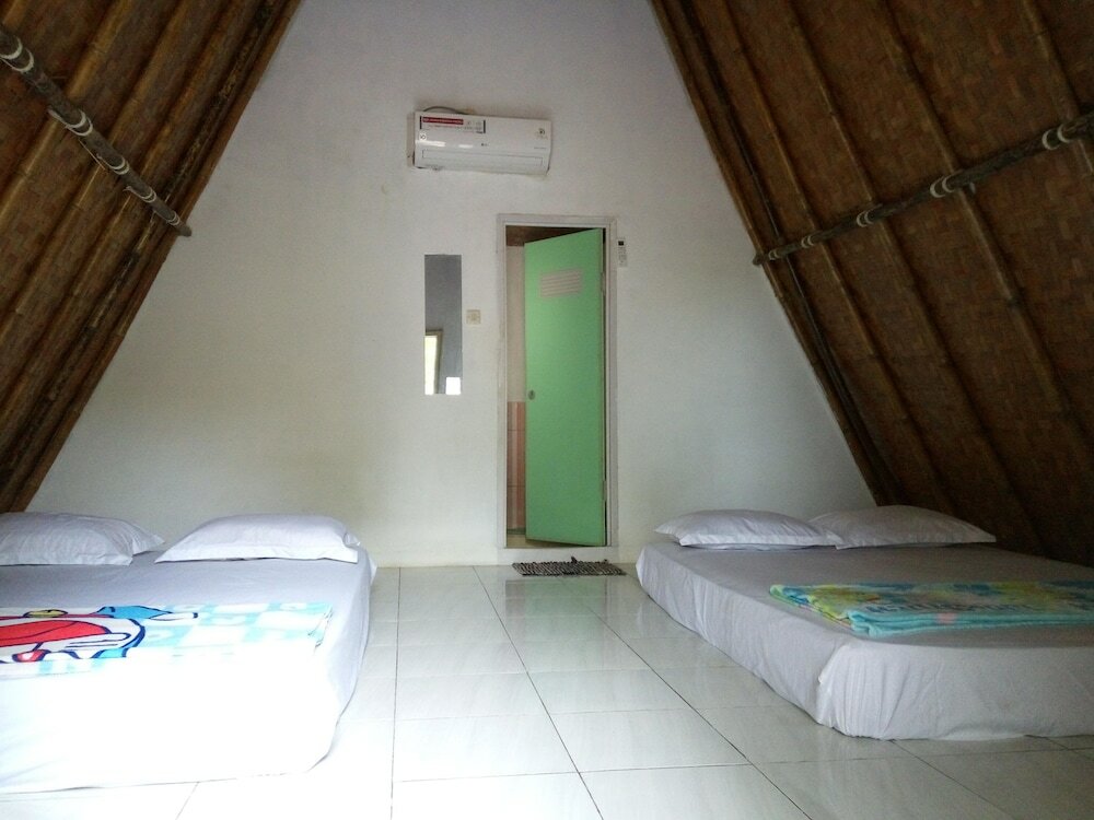 Фото Penginapan Bunar Tunggal