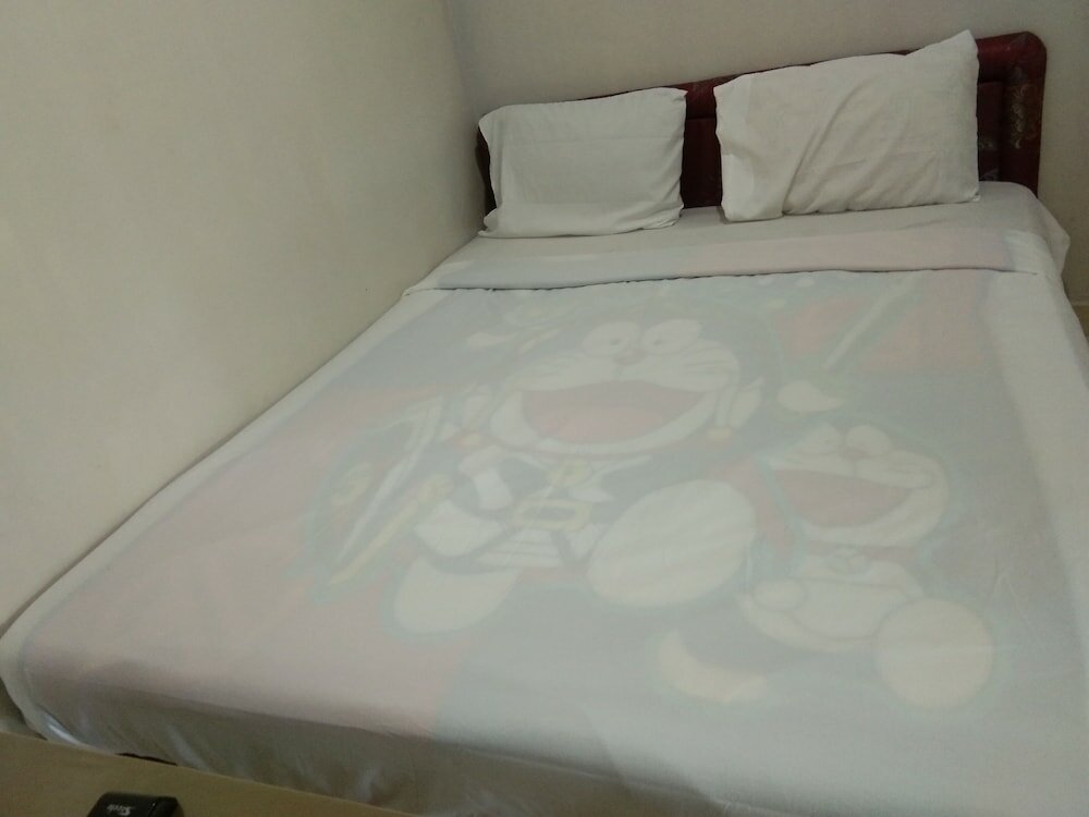 Фото Penginapan Bunar Tunggal