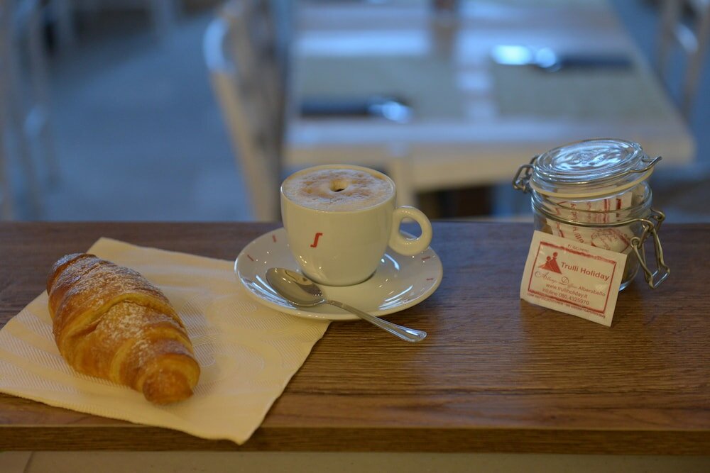 Фото Trulli Holiday Albergo Diffuso