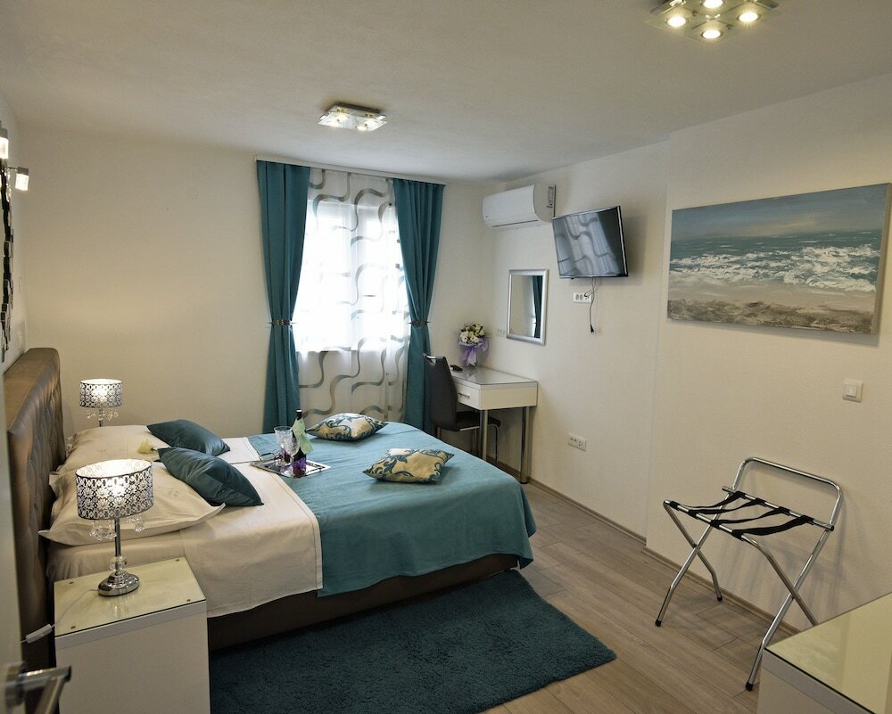 Фото Kuzma Rooms and Apartments