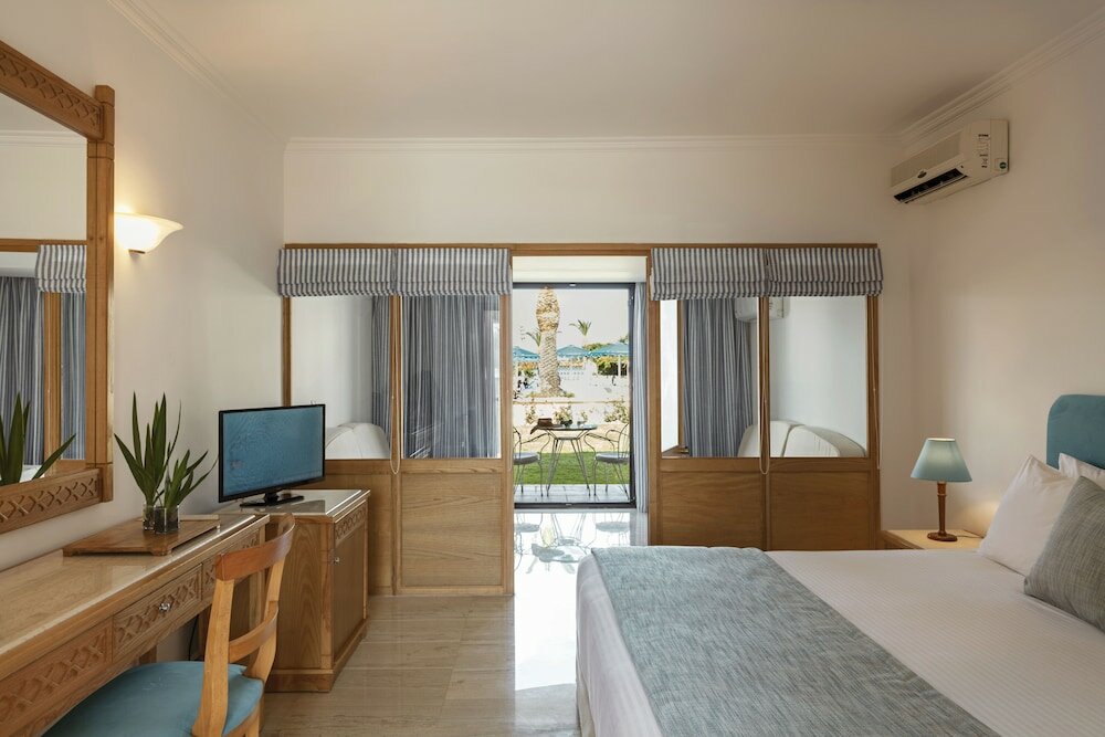 Фото Mitsis Ramira Beach Hotel - All Inclusive