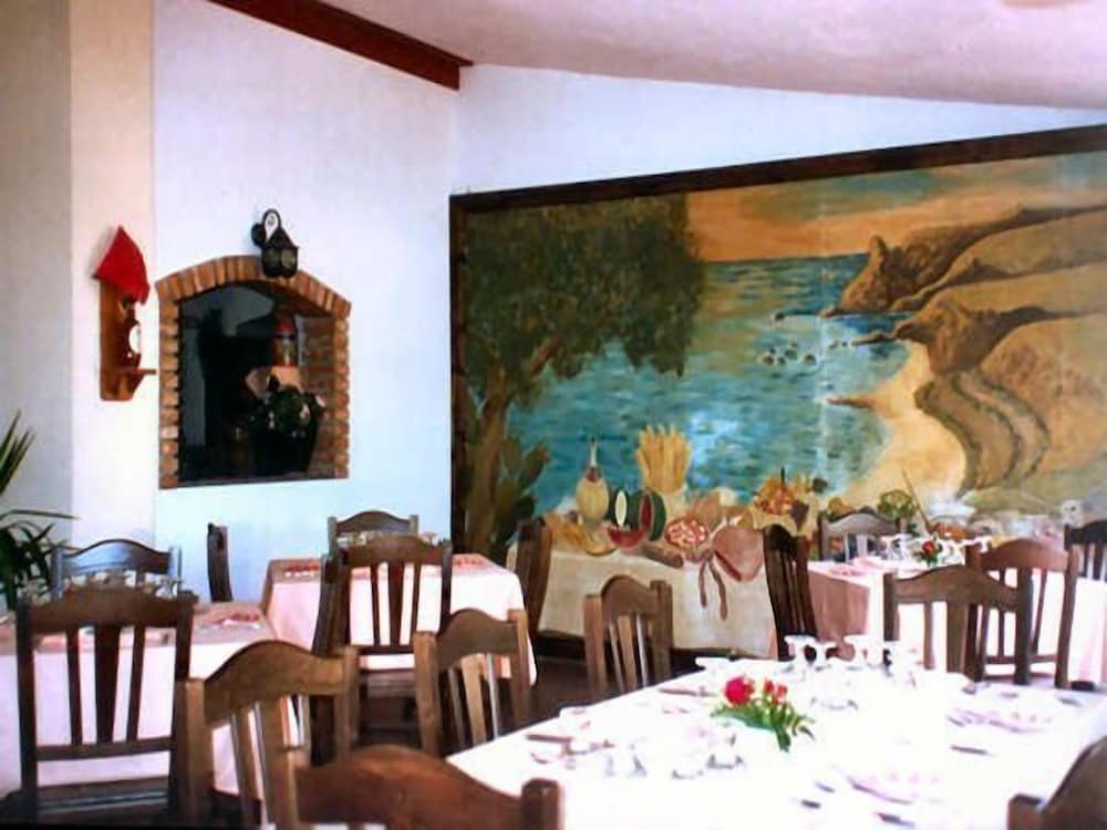 Фото Residence Hotel La Taverna