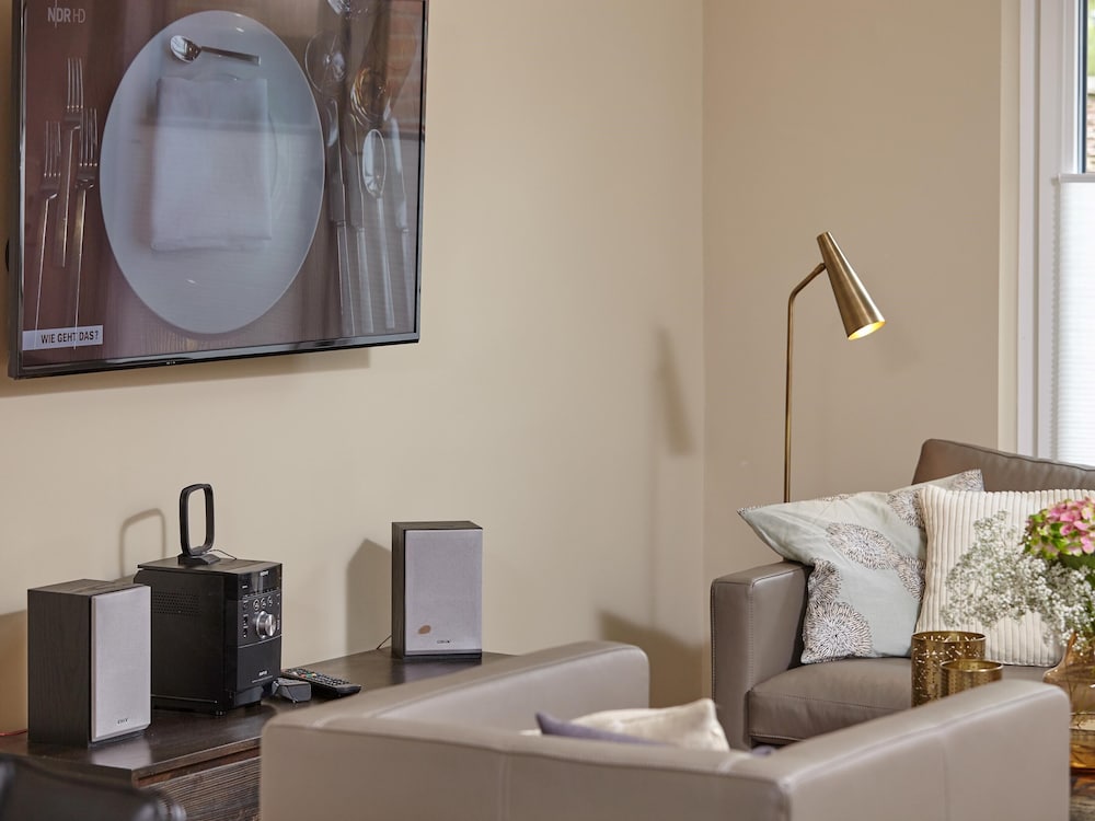 Фото Ferienhaus & Appartments Düneneck 8