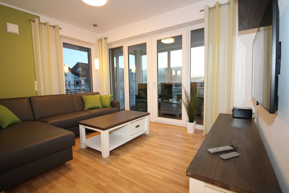 Фото Wohnen am Yachthafen W25