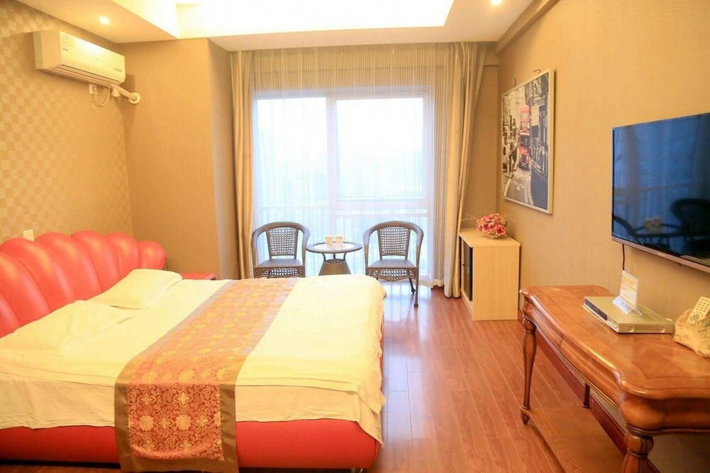 Фото Dalian Aolai Hotel Apartment