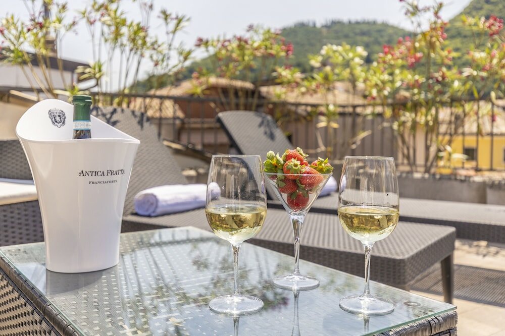 Фото Corte Realdi Boutique Rooms Garda