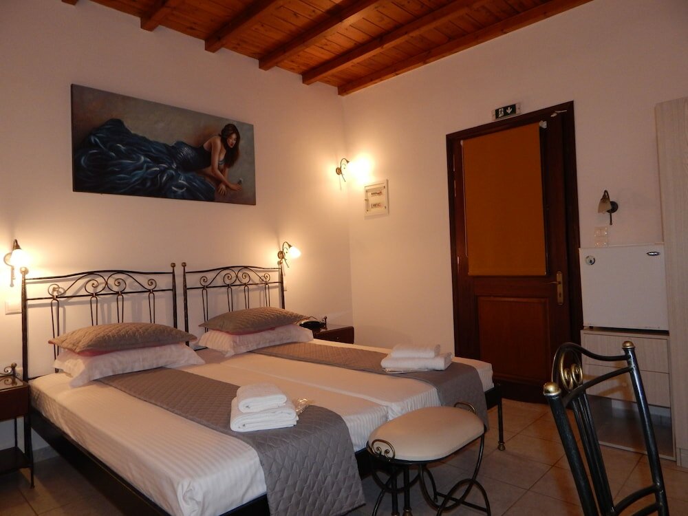 Фото Tinos Suites & Apartments