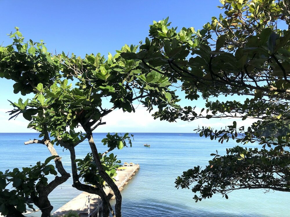 Фото Sand And Tan Beach Hotel