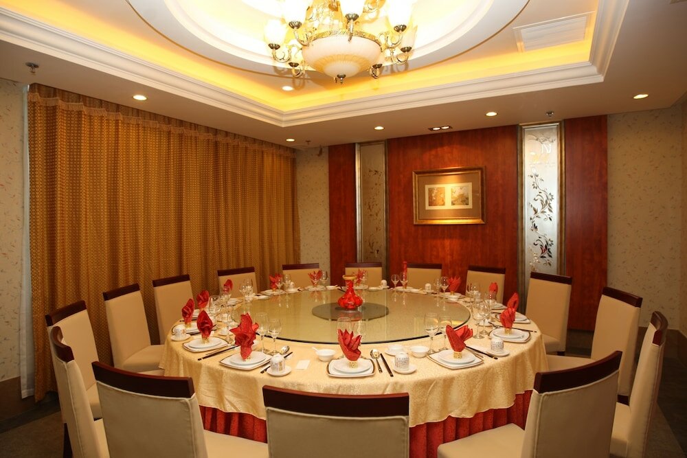 Фото Overseas Chinese International Hotel