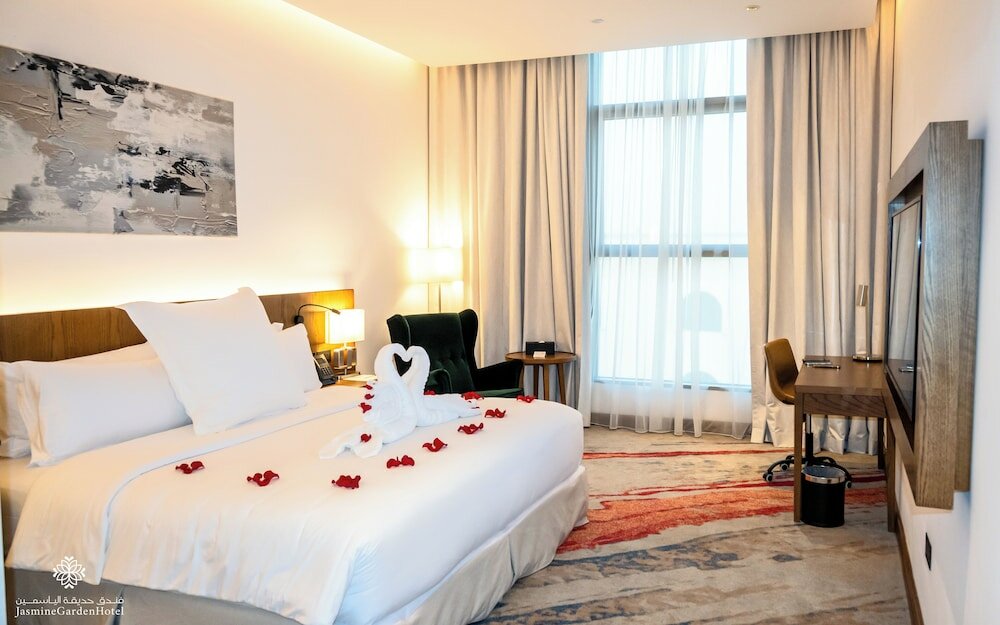 Фото Jasmine Garden Hotel