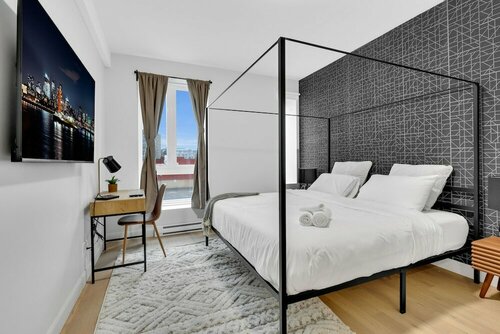 Гостиница Deluxe Suites Downtown Montreal в Монреале